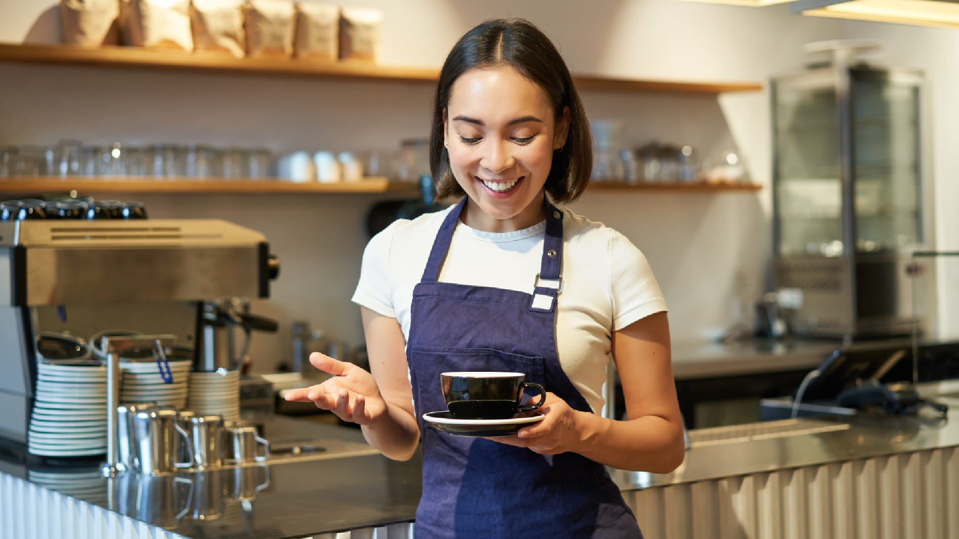 female-barista-making-coffee